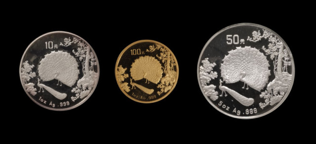 1993年孔雀开屏1盎司金、5盎司银、1盎司银币各一枚（无图）