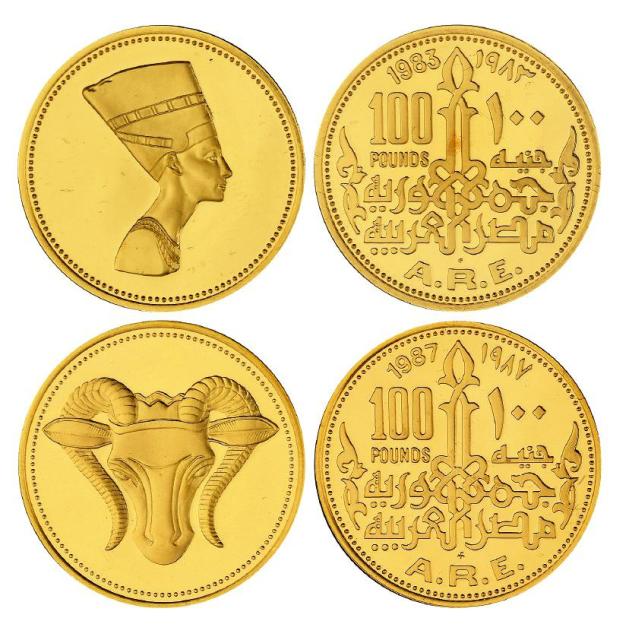 1983年埃及纳芙蒂蒂王后像、1987年羊首神像纪念金币各一枚